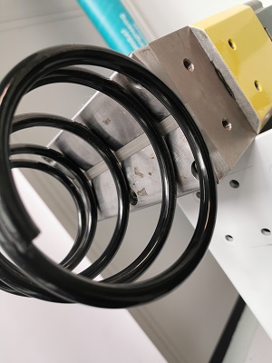 Robotic handling of springs with magnetic gripper